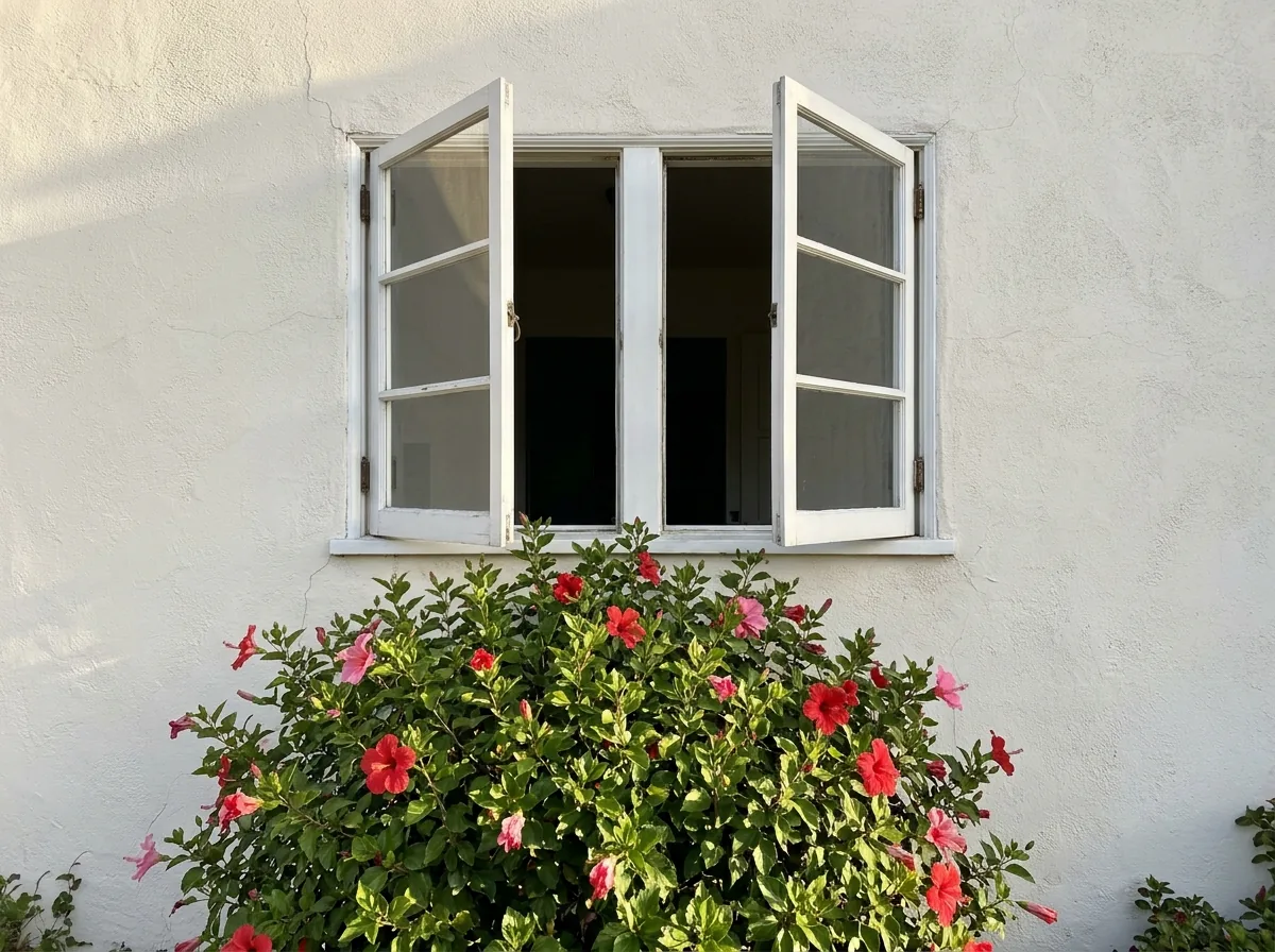 Pair of casement sashes opening outward from the center like French doors