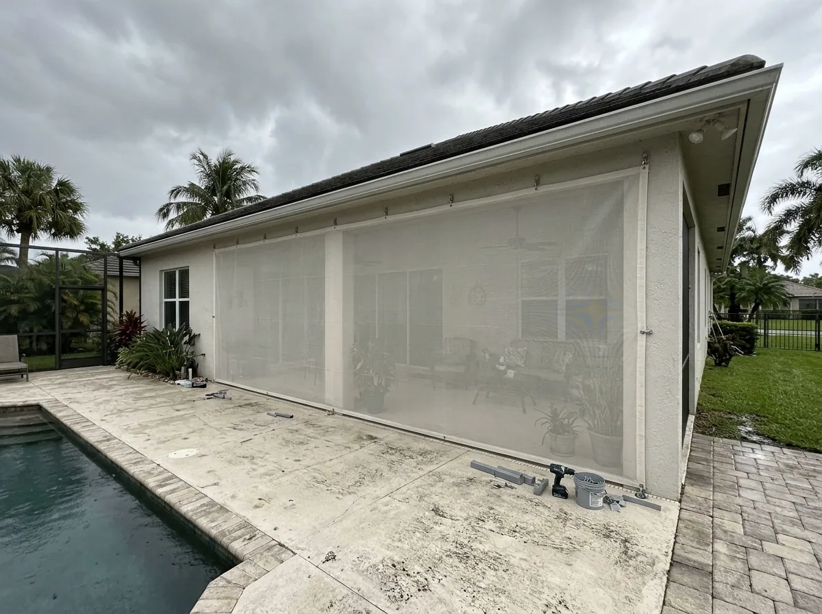 Translucent fabric hurricane screen stretched over a lanai opening