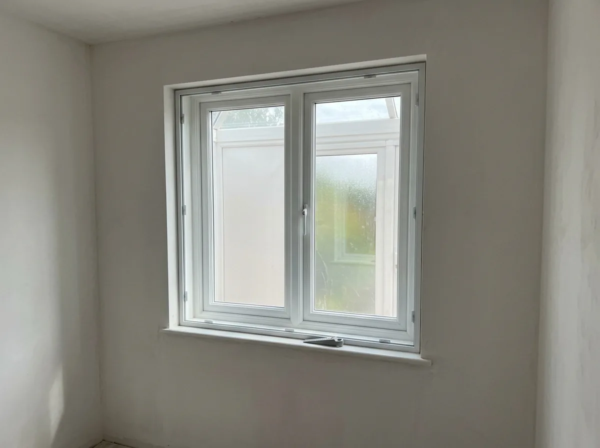 Clear interior window insert fitted inside an existing window frame